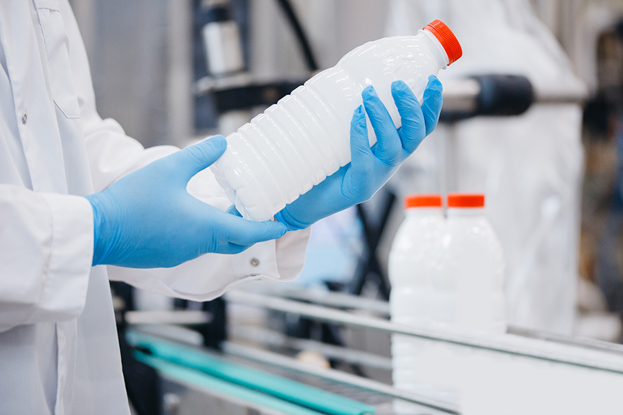 Bottle inspection during audit. 