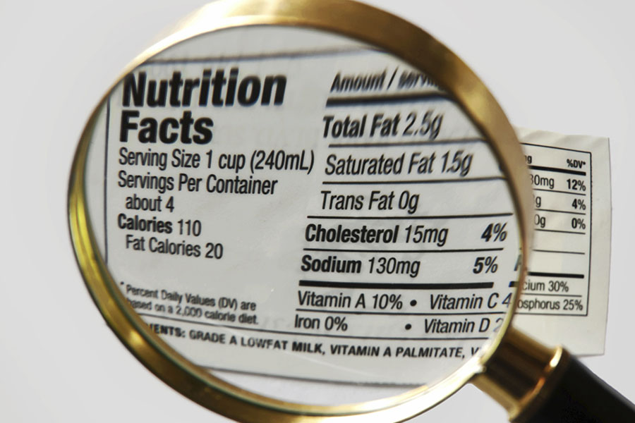 Nutrition facts with magnifying glass Nutrition facts with magnifying glass
